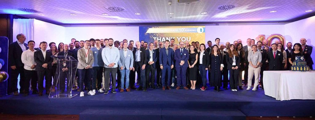 Group photo celebrating the 10-year milestone of the Heat Pump KEYMARK scheme.
