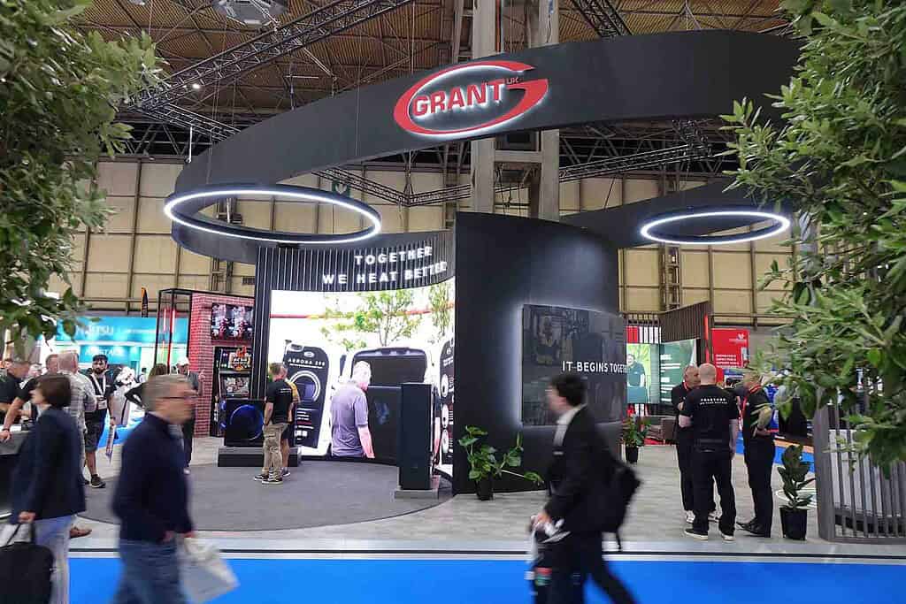 High-tech Grant exhibition booth showcasing innovative heating and cooling solutions at a trade even.