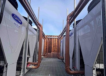 District heat pump solution solves college dilemma