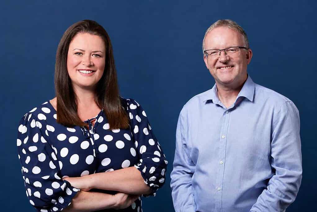 Lisa Cooke and Ian Rippin smiling at Heat Pump News event.