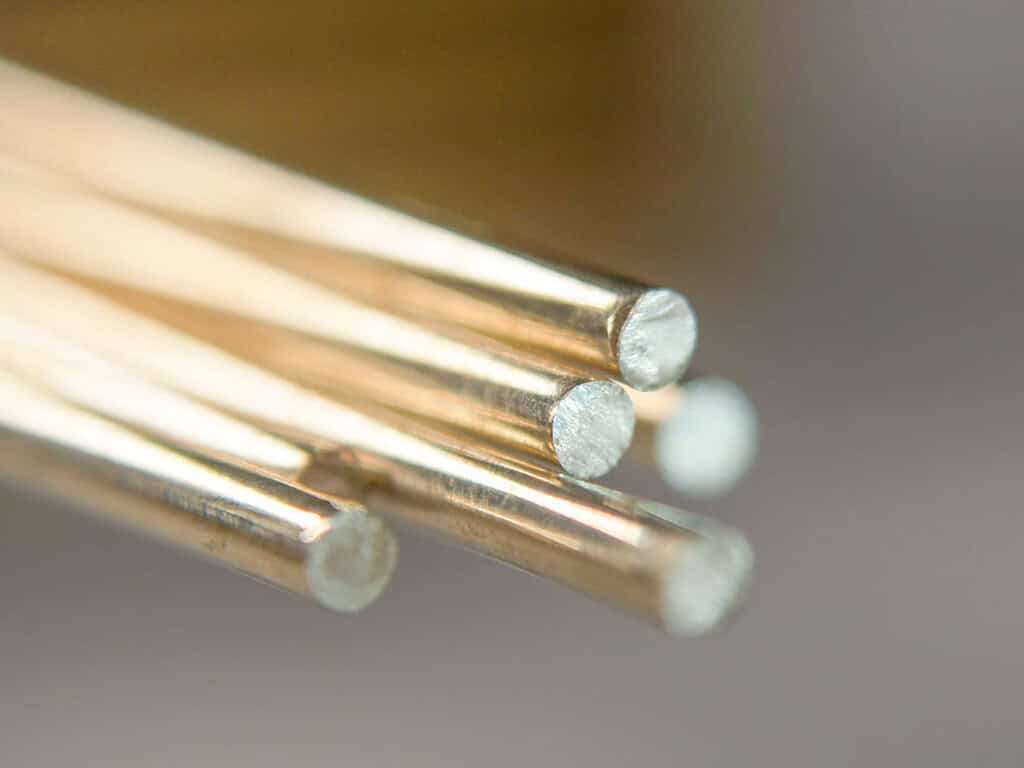 Close-up of copper pipes used in heat pump systems for efficient heating.