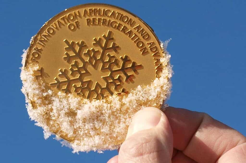 Gold medal for refrigeration innovation with snow-like coating.