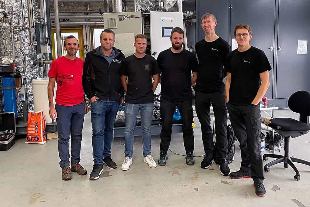 Image shows engineers from Solid Energy and Clayton who are working to develop an industrial heat pump to generate steam at up to 4 bar