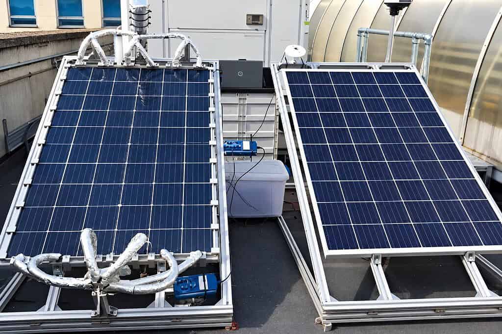 Solar-assisted heat pump system with solar panels on a rooftop.